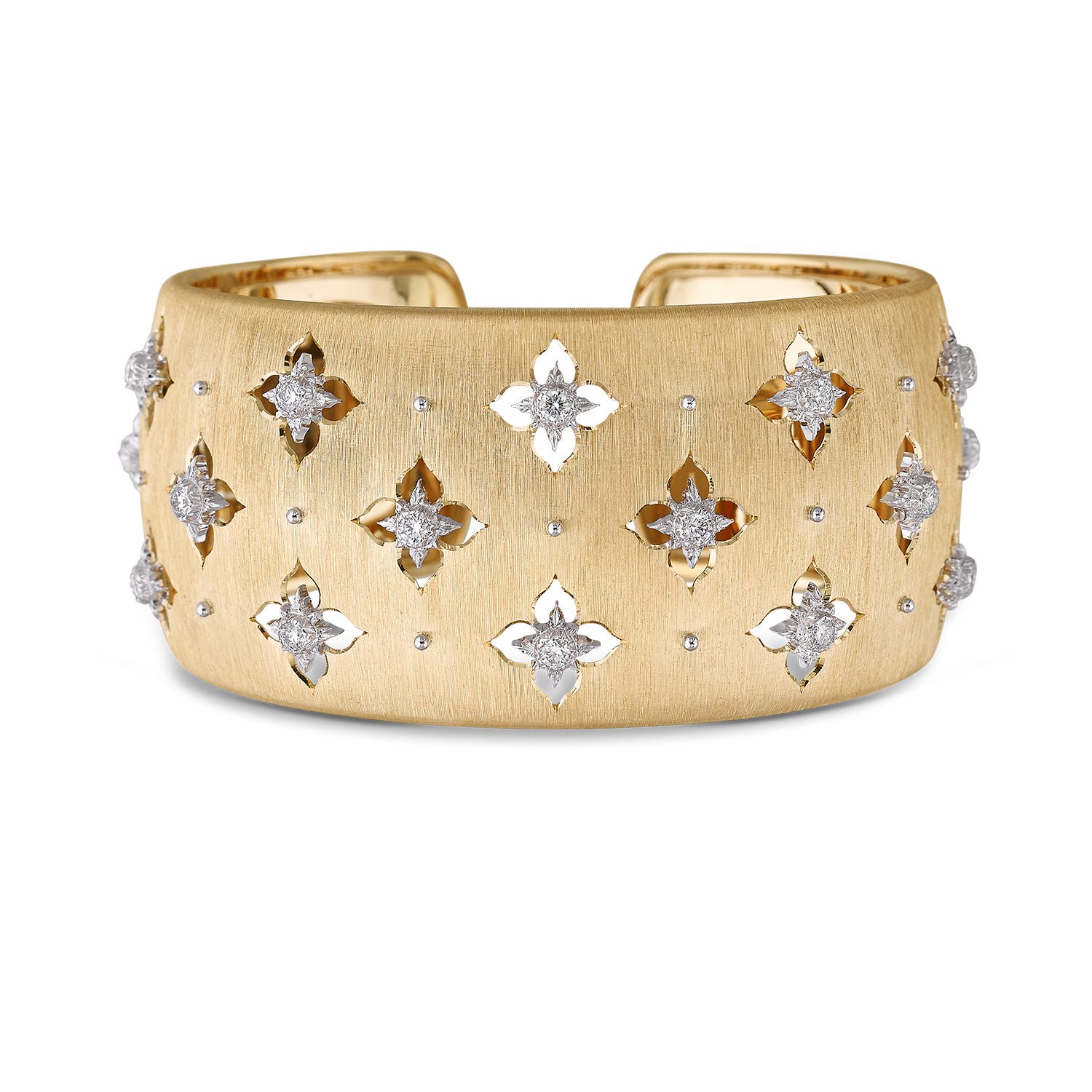 A woman in a gray cashmere sweater with a Fair Isle print.