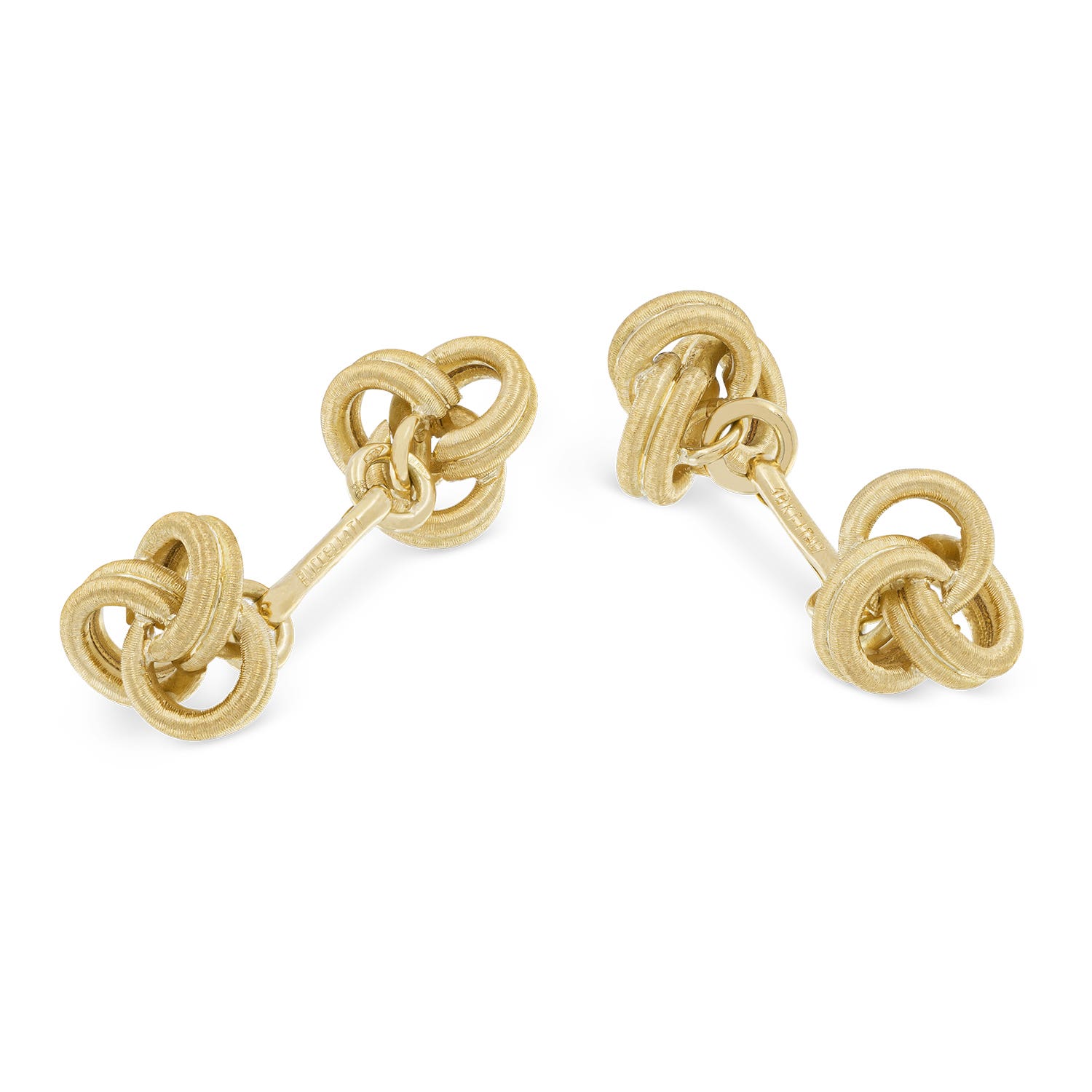 Woman in a sleeveless black top and dark blue jeans.